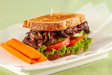 A vegan BLT sandwich using Dulse (seeweed) for bacon.