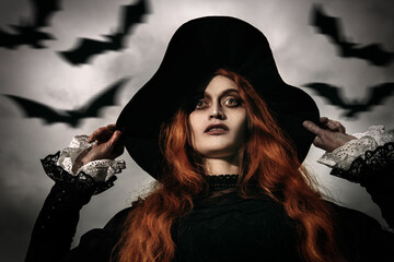 dark lady in black hat