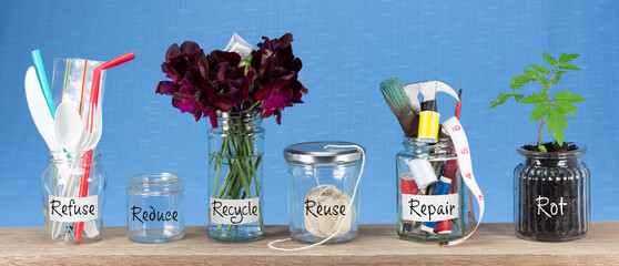 Zero Waste management, illustrated in 6 jars with text Refuse, reduce, recycle, repair, reuse, rot....
