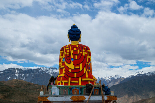 Langza Buddha statue on a cloudy day
