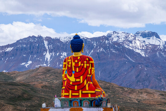 Langza Buddha statue on a cloudy day