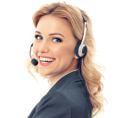 Call center. Smiling young female support phone operator in headset, in grey confident suit,...