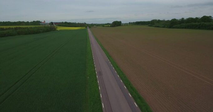 Countryside Road in South Sweden Sk&aring;ne, &Ouml;sterlen, Tosterup, Aerial High Forward