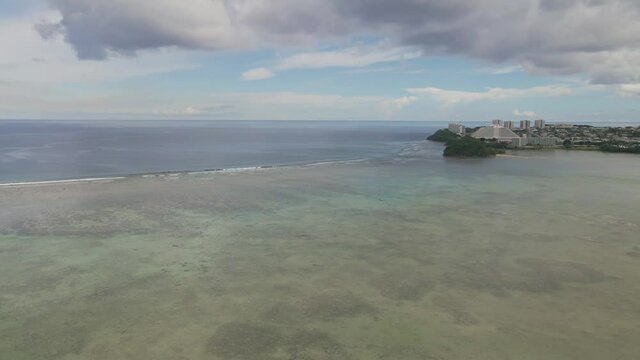 Drone slowly panning over downtown tamuning on the island of Guam