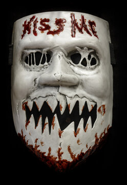 Kiss Me Face Mask Isolated Against Black Background