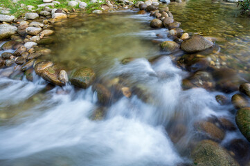 Fototapeta na wymiar the river in the mountains, mountain stream