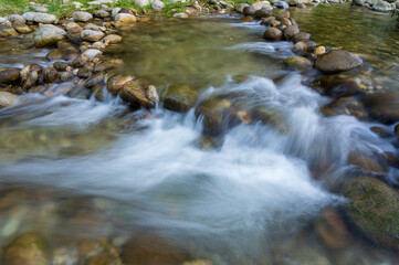 Fototapeta na wymiar the river in the mountains, mountain stream