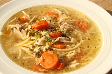 a delicious chicken soup with carrots
