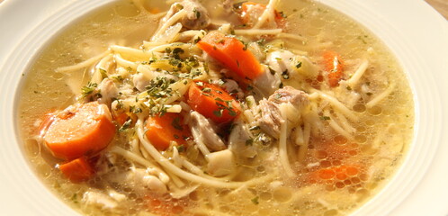 a delicious chicken soup with carrots