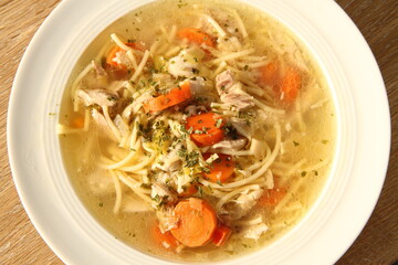 a delicious chicken soup with carrots