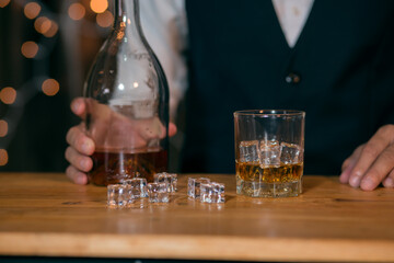 Barman pouring whiskey whiskey glass beautiful night