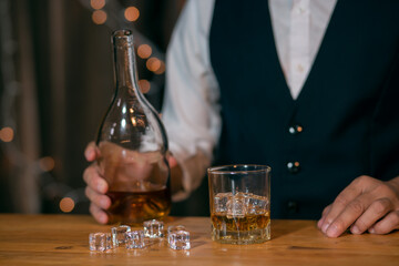 Barman pouring whiskey whiskey glass beautiful night