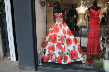 Red and white dresses in a display window