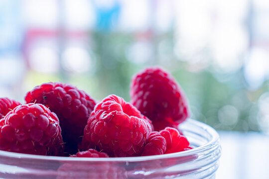 Close up of plate with raspberries