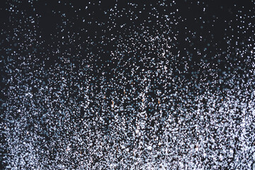 Light glitters on dark background