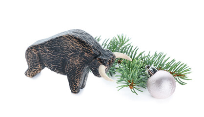 Figurine of bull and New Year decor on white background