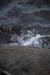 rocks with water slamming in