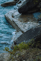 rocks with water slamming in