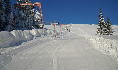 Winter landscape with a ski slope.