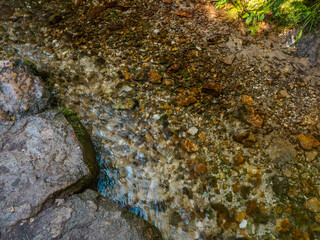 The most famous source of natural mineral water, wellspring. Green welspring at the maple mountaim in Mari El, Russia
