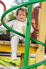 Fototapeta na wymiar toddler on the playground