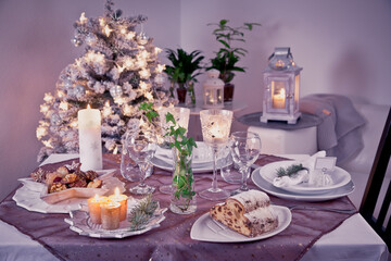 Table setting for celebration Christmas and New Year Holidays. Festive table at home.