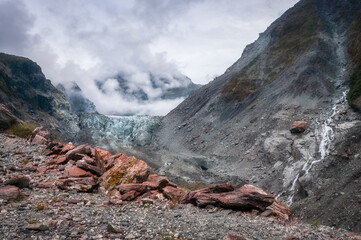 Amazing view from Robert's Point Track at Franz Josef Glacier melting into Waiho River and with...