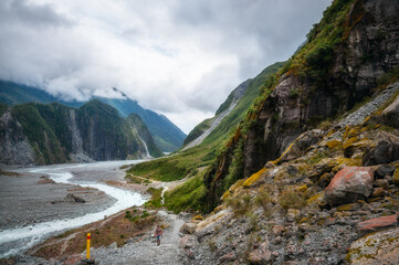 Fototapeta na wymiar Waiho River Valley panoramic landscape from the trail to Franz Josef Glacier in Westland Tai Poutini National Park, South Island, New Zealand.