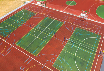 Outdoor sports complex on sunny day, aerial view