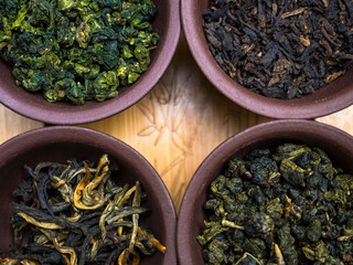 Fototapeta premium Clay cups with tea, Chinese tea ceremony