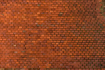 Fototapeta na wymiar Old vintage red brick wall background, closeup photo