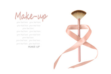 One cosmetic makeup brushes with pink ribbon with free text space isolated on a white background.