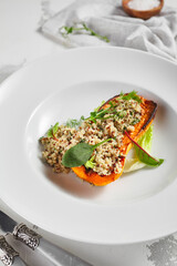 Stuffed butternut squash with fresh greens