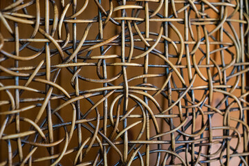 Fototapeta premium Close-Up of Decorative Woven Rattan Pattern with Abstract Interlacing Design