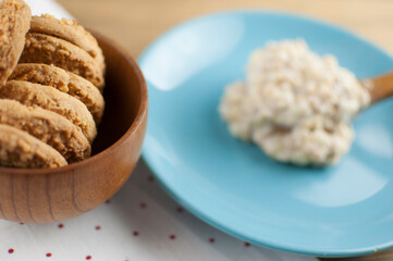Breakfast: Healthy food classic porridge in blue dish on wood background. oatmeal food breakfast. Top view.