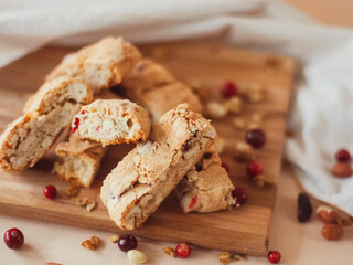 freshly baked homemade cookies with nuts and cranberries