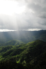 view of the sunny mountains in the morning hits the mountains.forest in Thailand