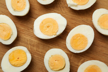 Board with hard boiled eggs, close up