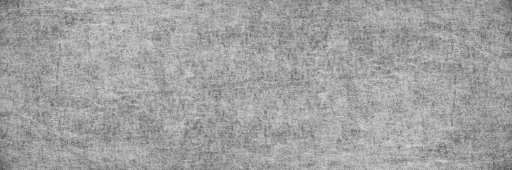 Fototapeta premium Black and white abstract background. Light gray texture of rough natural fabric. Denim texture. Wide web banner.