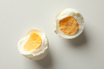Boiled egg on white background, close up