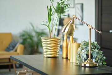 workplace in the living room. Business office desk with gold colors. Modern design. Minimal style.