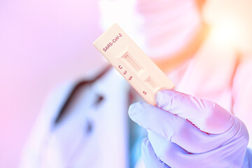 Medic shows rapid laboratory COVID-19 test for detection of specific antibodies to Novel...