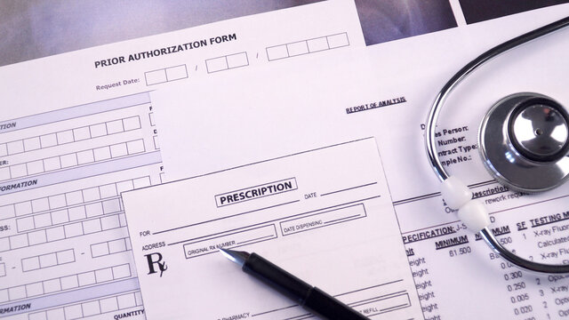 Prior Authorization Form, Report Of Analysis Form, X-ray Picture And Prescription Blank Next To The Stethoscope And Pen