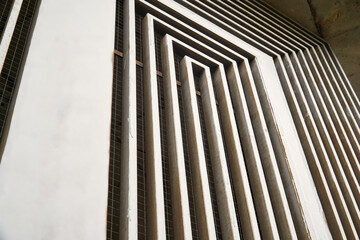 Abstract background. Outdoor air intake protective grilles for subway stations. Close-up