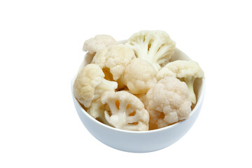 Frozen cauliflower florets in a bowl isolated on white backgroung, top view