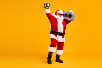 Full size photo of cool santa claus with grey beard listen x-mas christmas songs boom box hold...