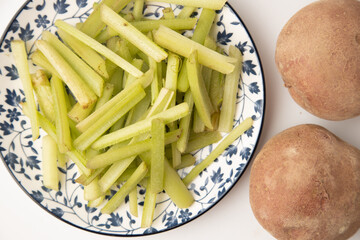 borage plant cut ready to cook on white background