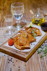 Roasted squid on board.