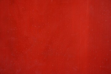 The walls are painted red with dry drip stains. for background.