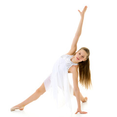 Obraz na płótnie Canvas Graceful Girl Gymnast Performing Rhythmic Gymnastics Exercise.
